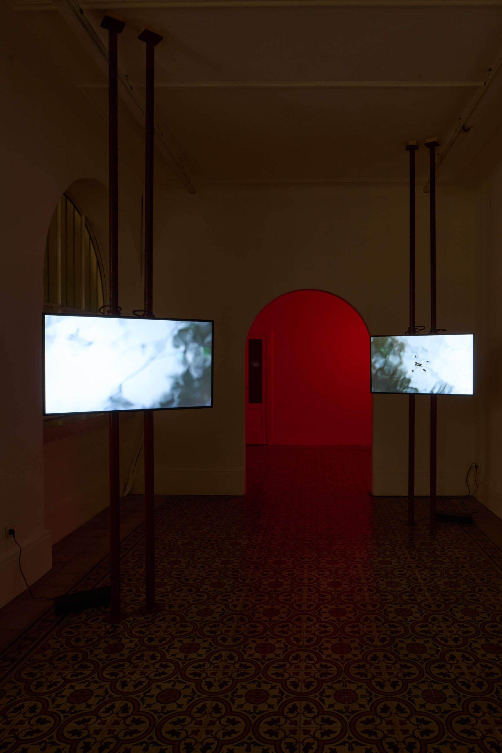 Marina Cavadini, Eat me, installation view, The Address, 2023 with two monitors to watch Marina's video Installation view of last exhibition at the gallery