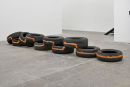 Untitled is a Site-specific project (2019) by Edoardo Caimi, made of tyres and spray paint Installation view of last exhibition at the gallery
