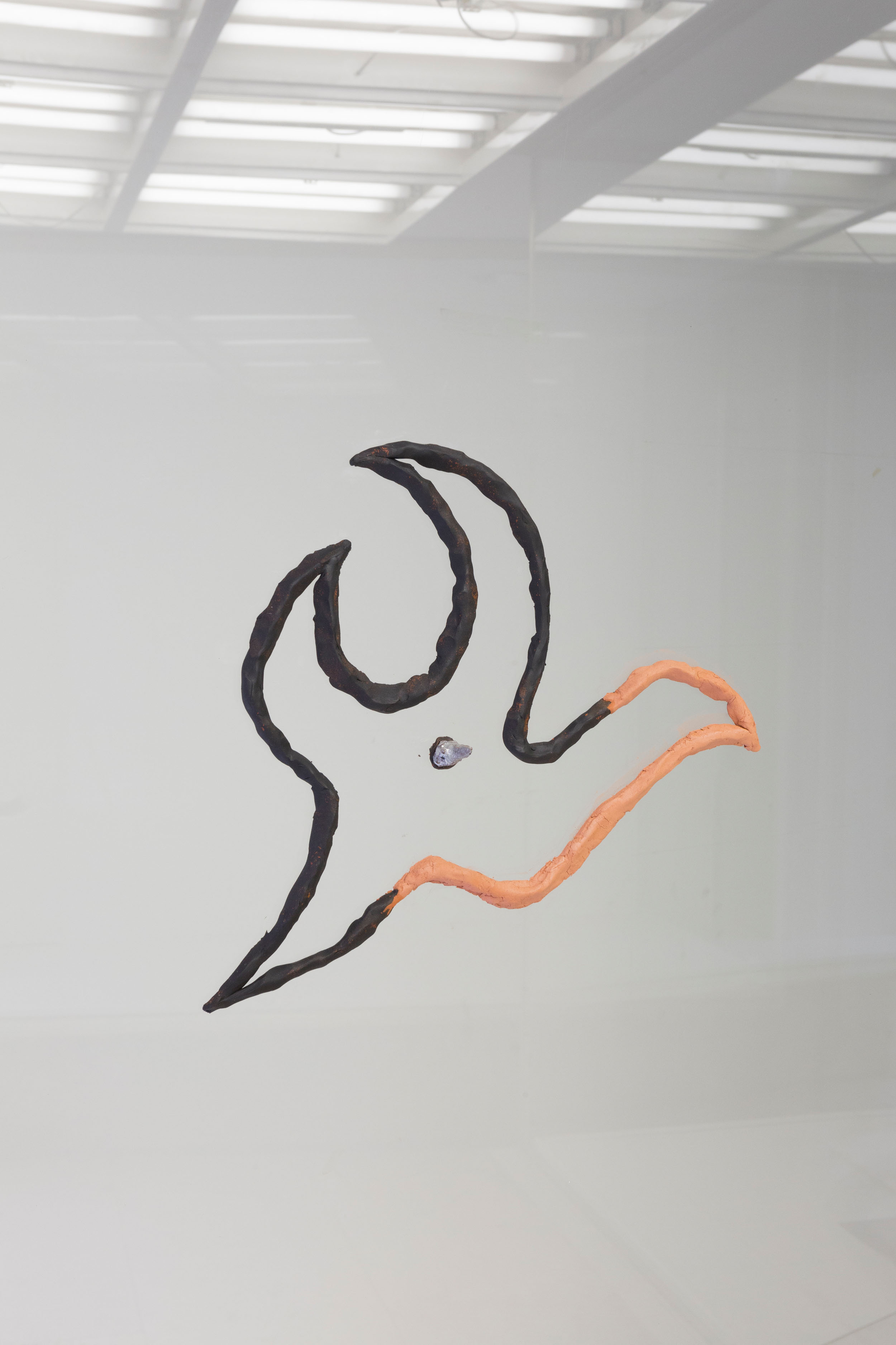 Testimonianz@ is a Site-specific project by Edoardo Caimi, 2019 made of clay, play dough, straw, carabiner and battery led Installation view of last exhibition at the gallery