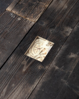 image shows a close-up view of the floor from the same installation, 